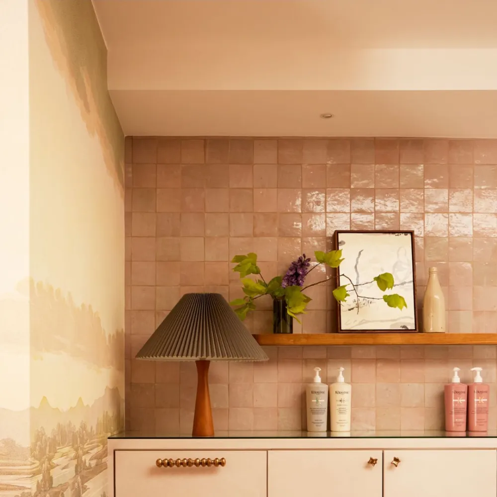 Hair salon back bar with handmade tiles and a timber shelf